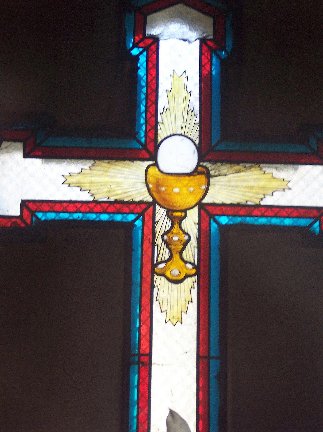 Eucharistie dans une croix